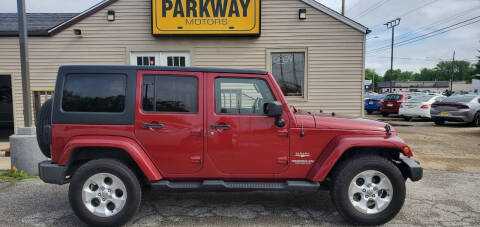 2013 Jeep Wrangler Unlimited for sale at Parkway Motors in Springfield IL