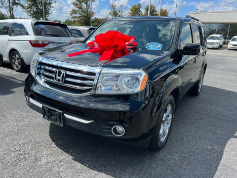 2014 Honda Pilot for sale at Charlotte Auto Group, Inc in Monroe NC
