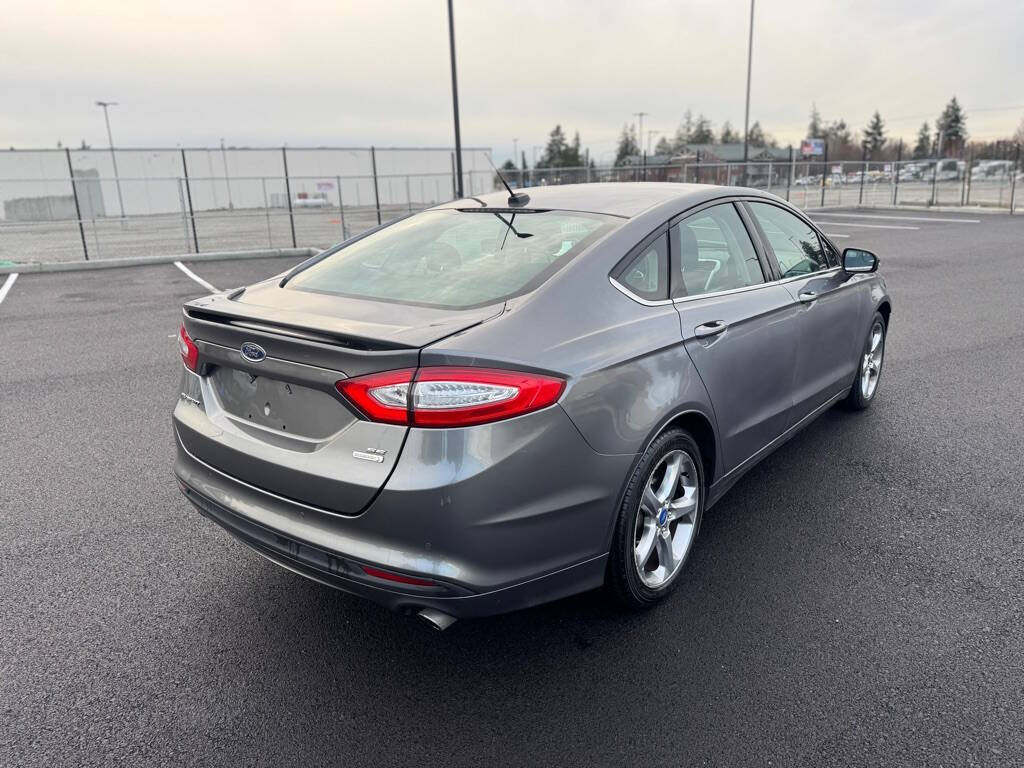 2013 Ford Fusion for sale at The Price King Auto in LAKEWOOD, WA