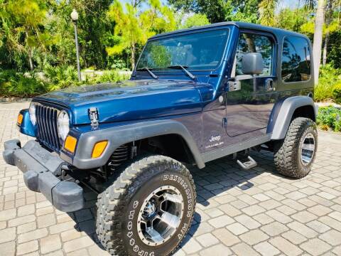 2004 Jeep Wrangler for sale at On Fire Car Sales in Tampa FL