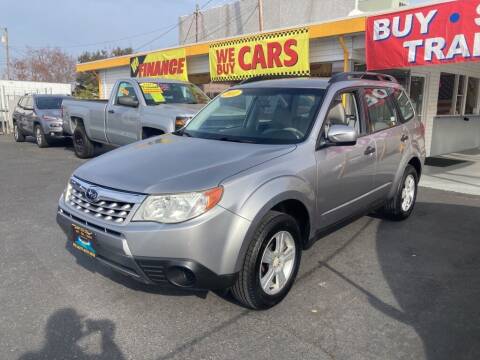2011 Subaru Forester for sale at Speciality Auto Sales in Oakdale CA