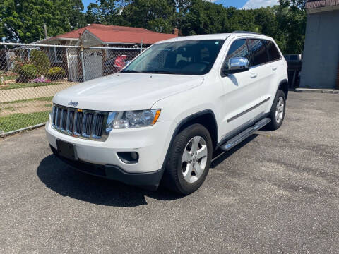 2013 Jeep Grand Cherokee for sale at American Best Auto Sales in Uniondale NY