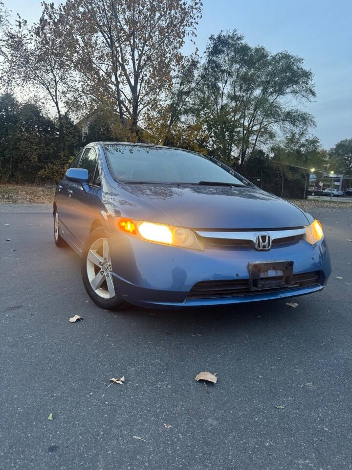 2006 Honda Civic for sale at H & H AUTO GROUP in Detroit, MI