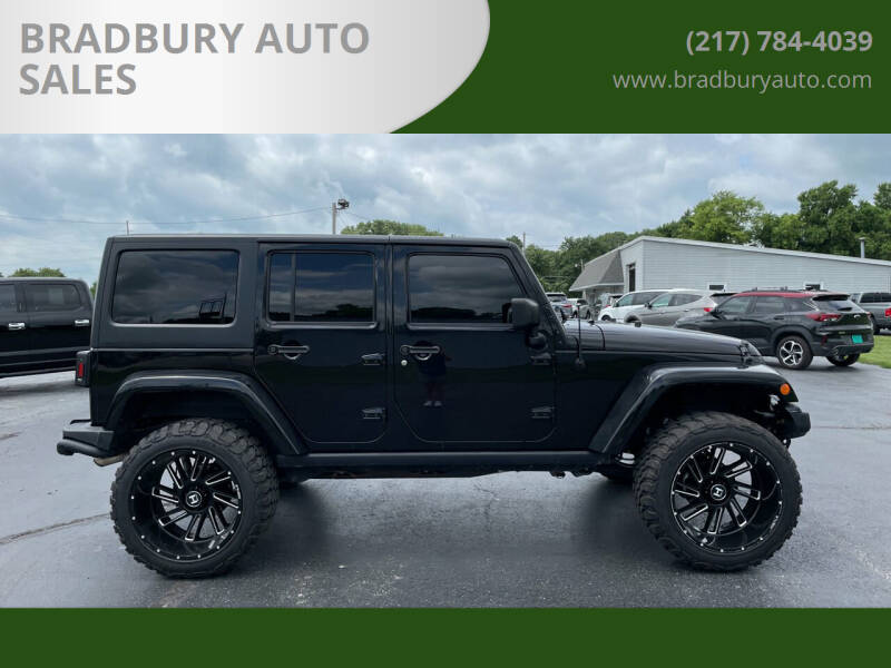 2016 Jeep Wrangler Unlimited for sale at BRADBURY AUTO SALES in Gibson City IL