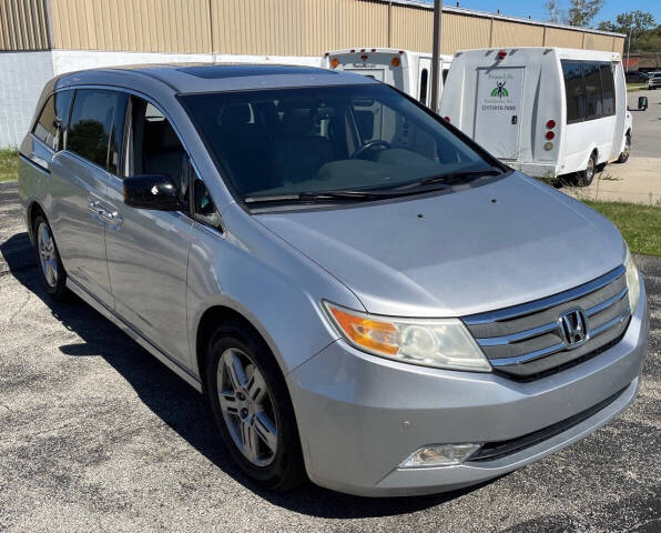 2011 Honda Odyssey for sale at HEARTLAND AUTO SALES in Indianapolis, IN