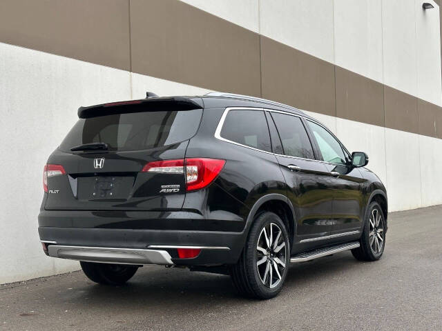 2021 Honda Pilot for sale at Phoenix Motor Co in Romulus, MI