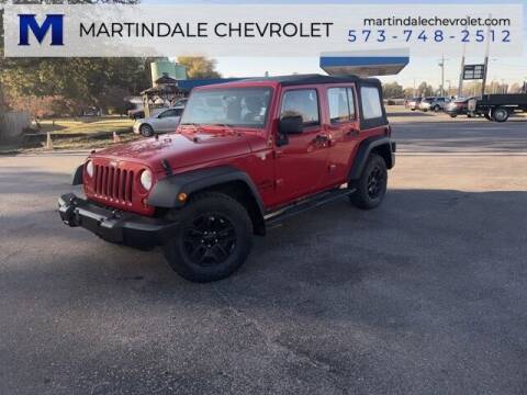 2013 Jeep Wrangler Unlimited for sale at MARTINDALE CHEVROLET in New Madrid MO