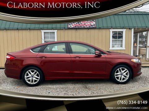 2014 Ford Fusion for sale at Claborn Motors, INC in Cambridge City IN
