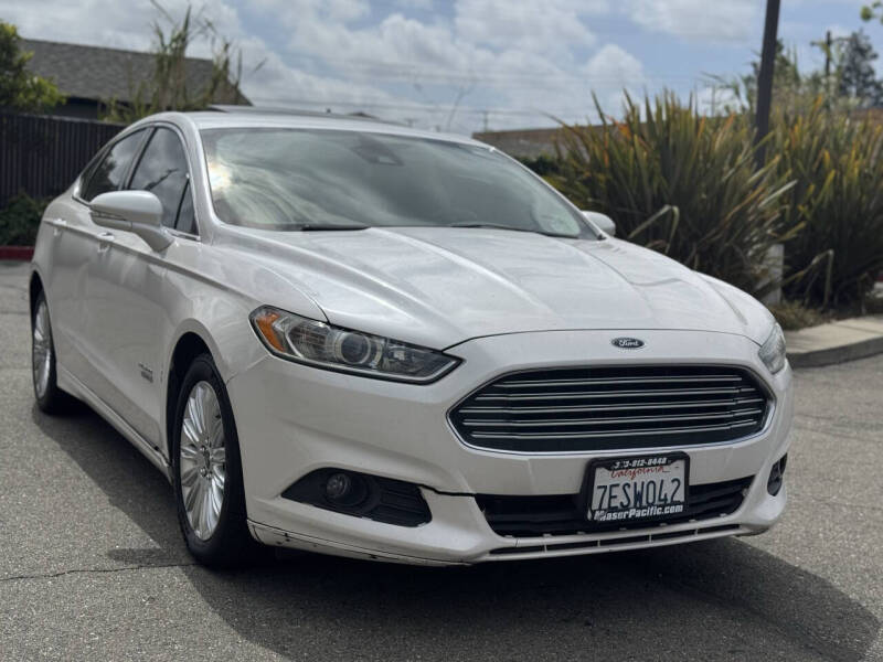 Used 2014 Ford Fusion Energi SE Luxury with VIN 3FA6P0PU3ER324703 for sale in San Leandro, CA