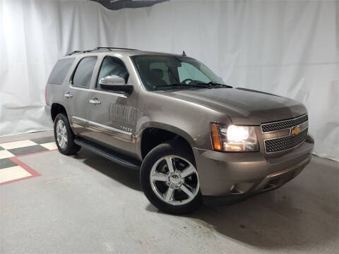 2013 Chevrolet Tahoe for sale at Tradewind Car Co in Muskegon MI