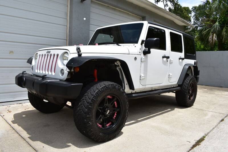 2014 Jeep Wrangler Unlimited for sale at Advantage Auto Group Inc. in Daytona Beach FL