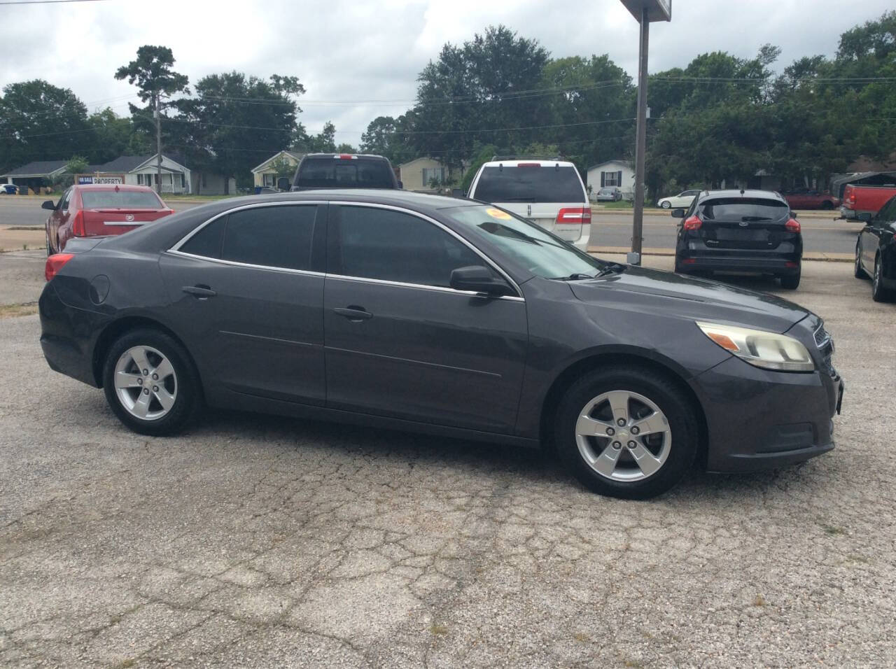 2013 Chevrolet Malibu for sale at SPRINGTIME MOTORS in Huntsville, TX