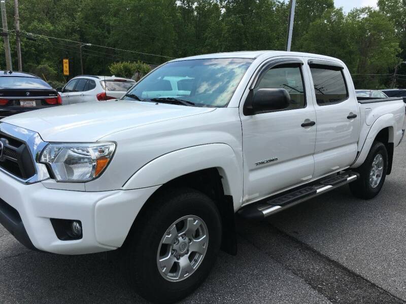 2015 Toyota Tacoma for sale at Highlands Luxury Cars, Inc. in Marietta GA