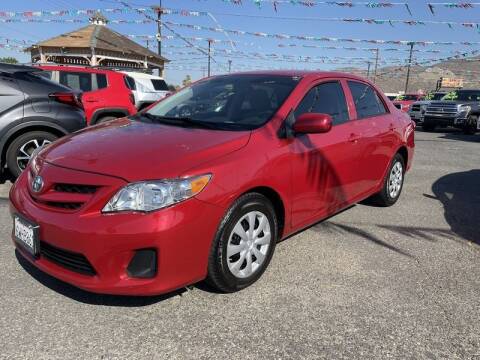2012 Toyota Corolla for sale at Los Compadres Auto Sales in Riverside CA