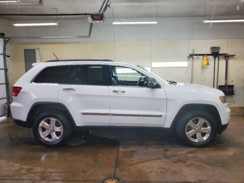 2013 Jeep Grand Cherokee for sale at MADDEN MOTORS INC in Peru IN
