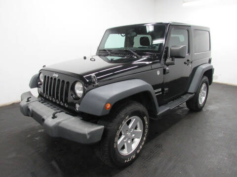 2014 Jeep Wrangler for sale at Automotive Connection in Fairfield OH