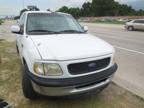 1997 Ford F-150 for sale at SCOTT HARRISON MOTOR CO in Houston TX