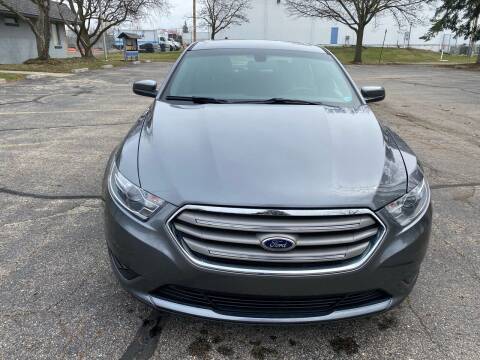 2014 Ford Taurus for sale at Mikhos 1 Auto Sales in Lansing MI