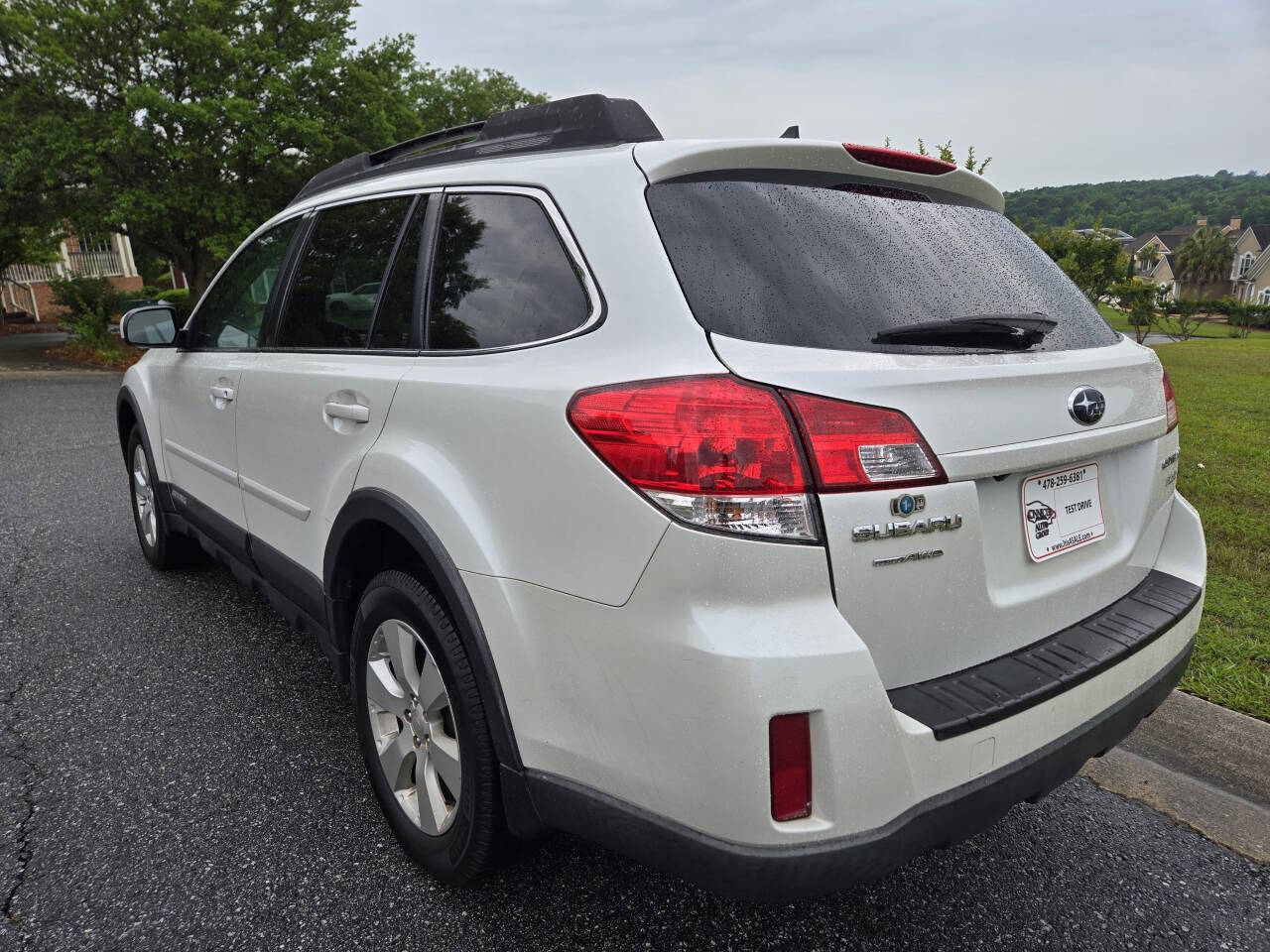 2011 Subaru Outback for sale at Connected Auto Group in Macon, GA