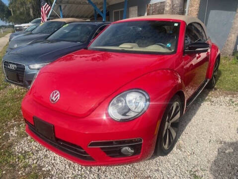 2013 Volkswagen Beetle Convertible for sale at Park Avenue Motors in New Smyrna Beach FL