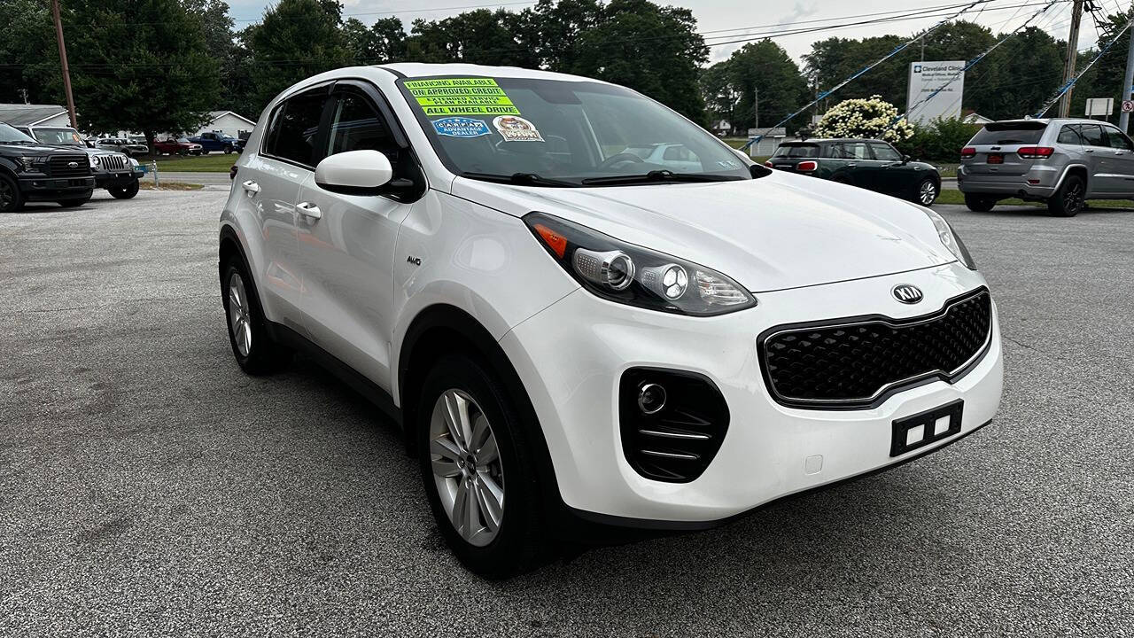 2017 Kia Sportage for sale at North Ridge Auto Center LLC in Madison, OH