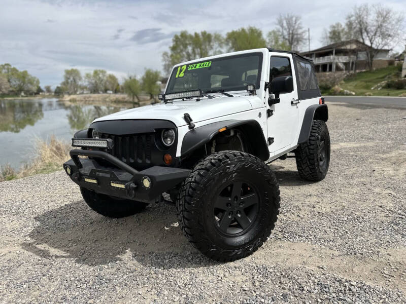 Used 2012 Jeep Wrangler Sport with VIN 1C4GJWAG5CL201499 for sale in Salem, UT