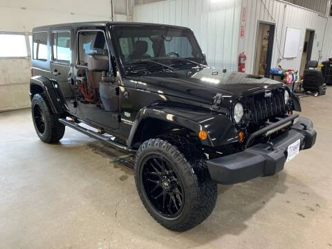 2011 Jeep Wrangler Unlimited for sale at Premier Auto in Sioux Falls SD