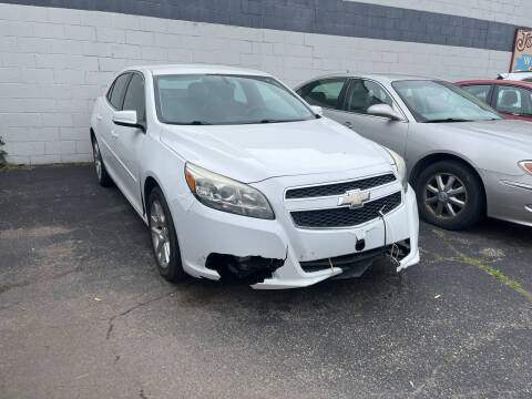 2013 Chevrolet Malibu for sale at Holiday Auto Sales in Grand Rapids MI