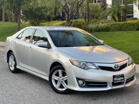 2013 Toyota Camry for sale at MILLENNIUM MOTORS in Van Nuys CA