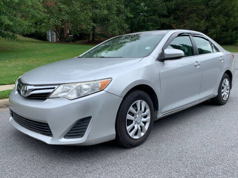2013 Toyota Camry for sale at SHURE AUTO SALES in Snellville GA