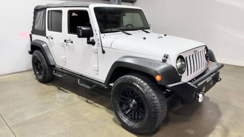 2016 Jeep Wrangler Unlimited for sale at AutoDreams in Lee's Summit MO