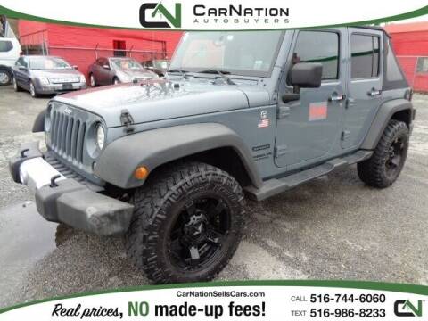 2014 Jeep Wrangler Unlimited for sale at CarNation AUTOBUYERS Inc. in Rockville Centre NY