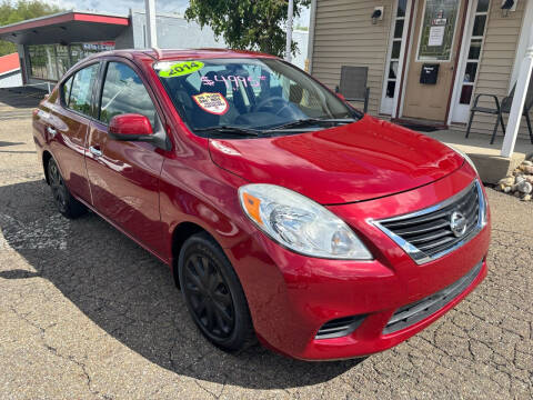 2014 Nissan Versa for sale at G & G Auto Sales in Steubenville OH