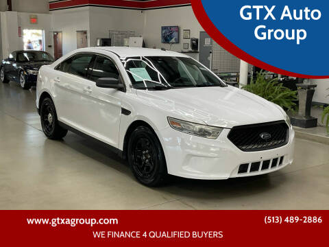 2014 Ford Taurus for sale at GTX Auto Group in West Chester OH