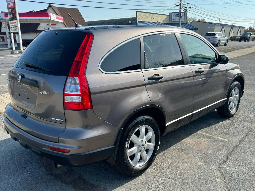 2011 Honda CR-V for sale at Phinney's Automotive Center in Clayton, NY