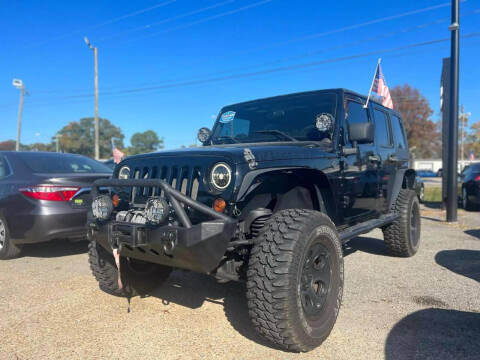 2010 Jeep Wrangler Unlimited for sale at Action Auto Specialist in Norfolk VA