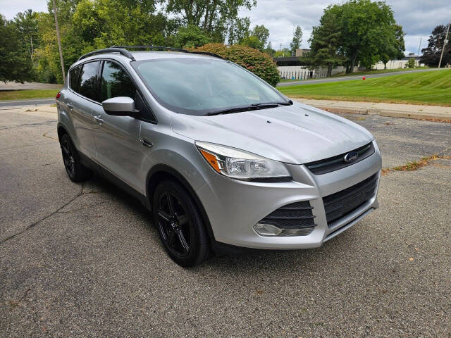 2013 Ford Escape for sale at WAGNER AUTO MART LLC in Ann Arbor, MI