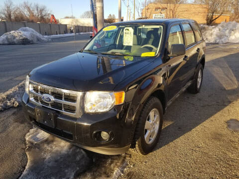 2010 Ford Escape for sale at Howe's Auto Sales in Lowell MA