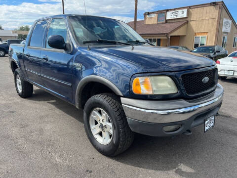 2002 Ford F-150 for sale at BERKENKOTTER MOTORS in Brighton CO