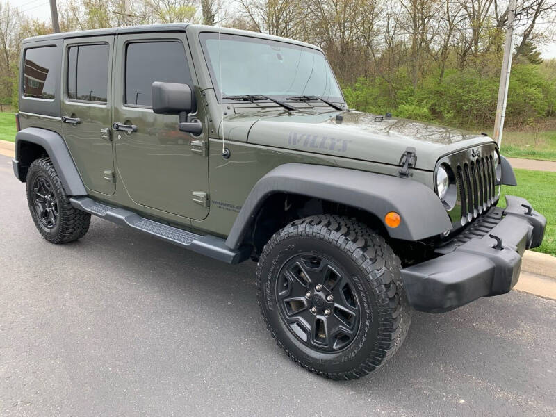 2015 Jeep Wrangler Unlimited for sale at Encore Auto in Niles MI