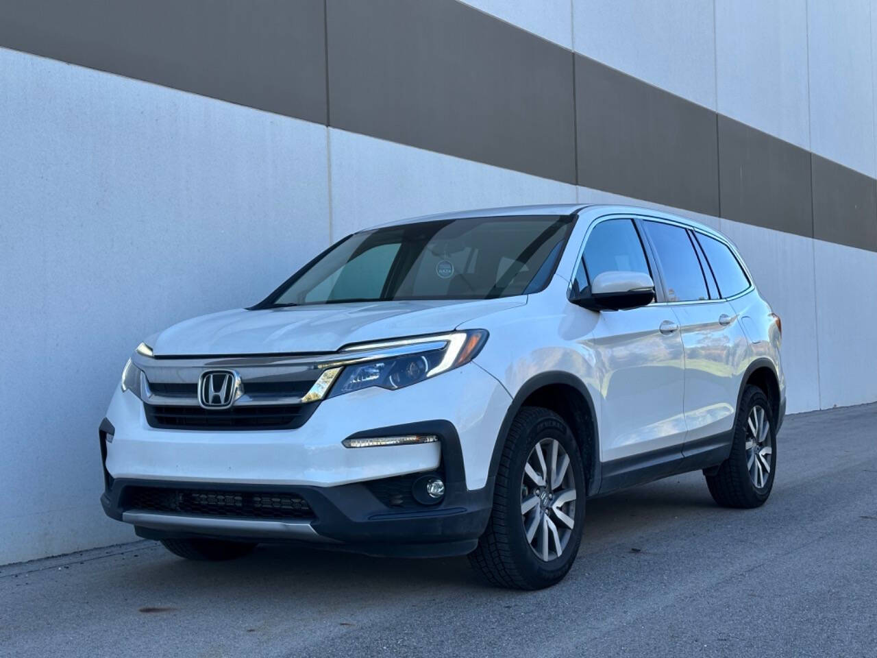 2020 Honda Pilot for sale at Phoenix Motor Co in Romulus, MI