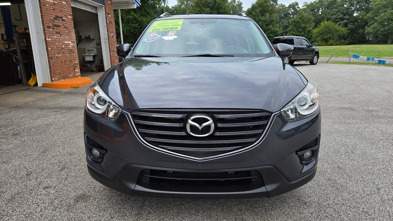 2016 Mazda CX-5 for sale at North Ridge Auto Center LLC in Madison, OH