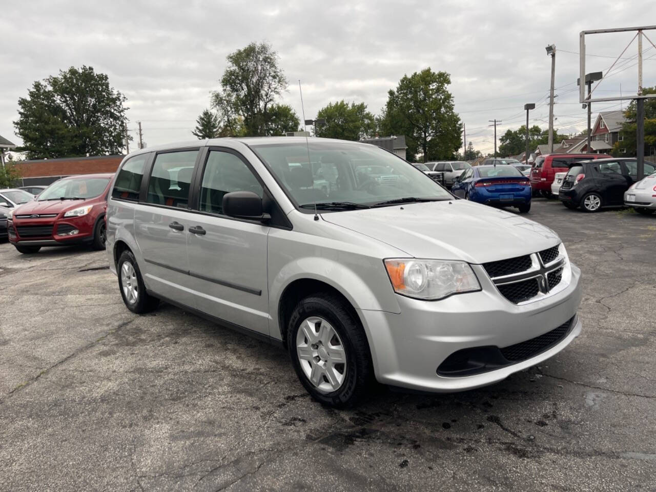 2012 Dodge Grand Caravan for sale at AVS AUTO GROUP LLC in CLEVELAND, OH