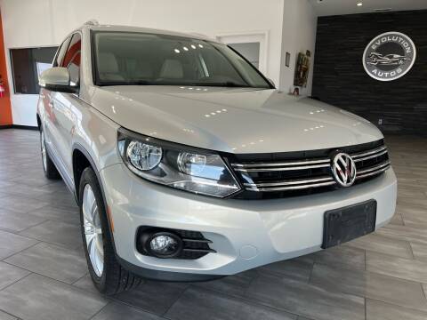 2014 Volkswagen Tiguan for sale at Evolution Autos in Whiteland IN