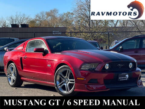 2014 Ford Mustang for sale at RAVMOTORS- Burnsville in Burnsville MN