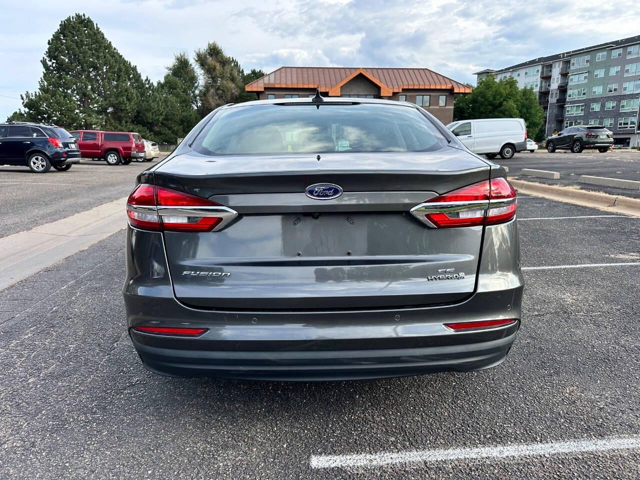 2019 Ford Fusion Hybrid for sale at AMZ Autos, LLC in Denver, CO