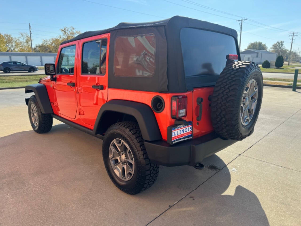 2015 Jeep Wrangler Unlimited for sale at Illinois Auto Wholesalers in Tolono, IL