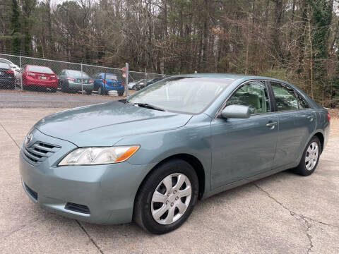 2009 Toyota Camry for sale at Legacy Motor Sales in Norcross GA