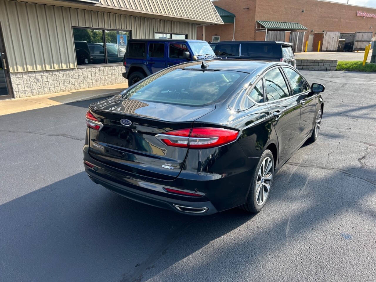 2019 Ford Fusion for sale at Wyrick Auto Sales & Leasing Inc in Holland, MI