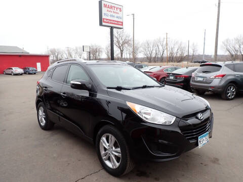 2012 Hyundai Tucson for sale at Marty's Auto Sales in Savage MN